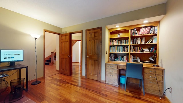 2903 Prairie Meadow Dr, Champaign, IL 61822 - home office featuring light wood-style floors and baseboards