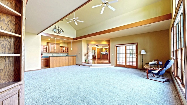 2903 Prairie Meadow Dr, Champaign, IL 61822 - living room featuring carpet, ceiling fan, and vaulted ceiling
