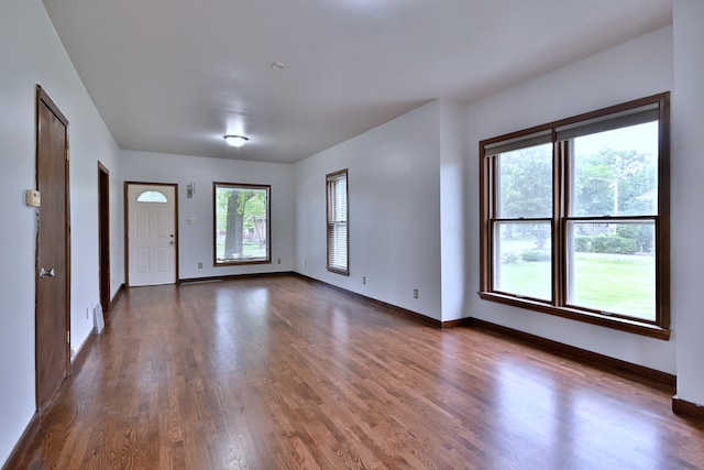 1021 Vine St, Joliet, IL 60435 - spare room with dark wood finished floors and baseboards