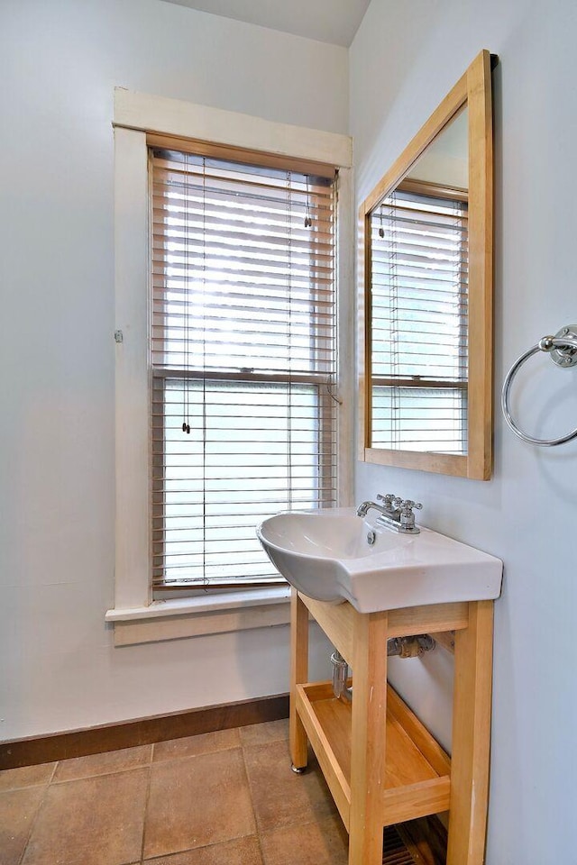 1021 Vine St, Joliet, IL 60435 - bathroom with baseboards and tile patterned floors