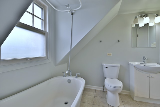 1021 Vine St, Joliet, IL 60435 - bathroom featuring a freestanding bath, vanity, toilet, and tile patterned flooring