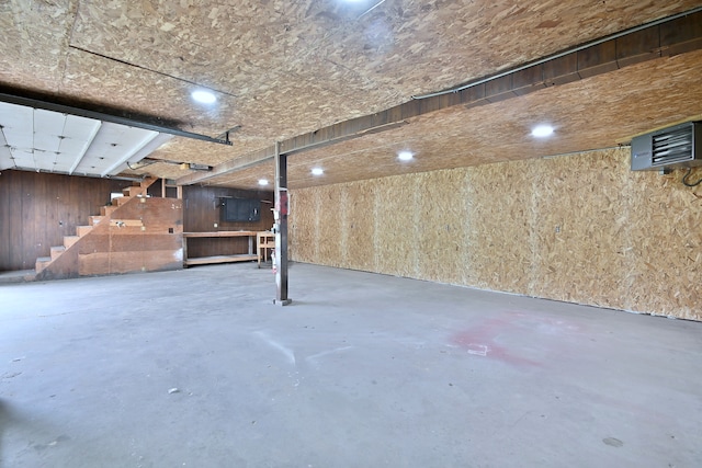 1021 Vine St, Joliet, IL 60435 - unfinished basement featuring stairs and a heating unit
