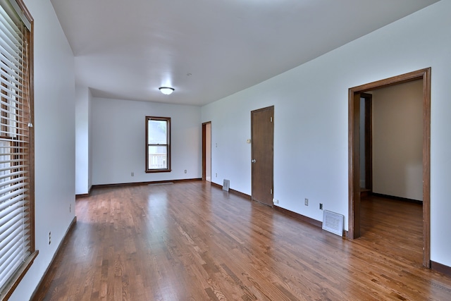1021 Vine St, Joliet, IL 60435 - unfurnished room featuring wood finished floors and baseboards