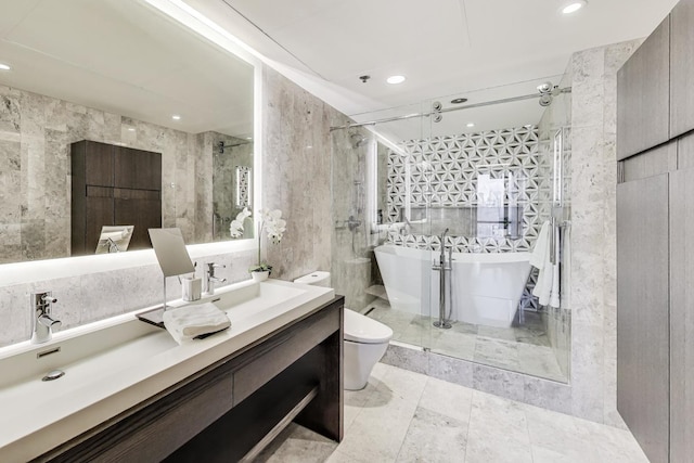 1530 S State St Unit 17B, Chicago, IL 60605 - full bathroom featuring a soaking tub, vanity, toilet, a shower stall, and recessed lighting