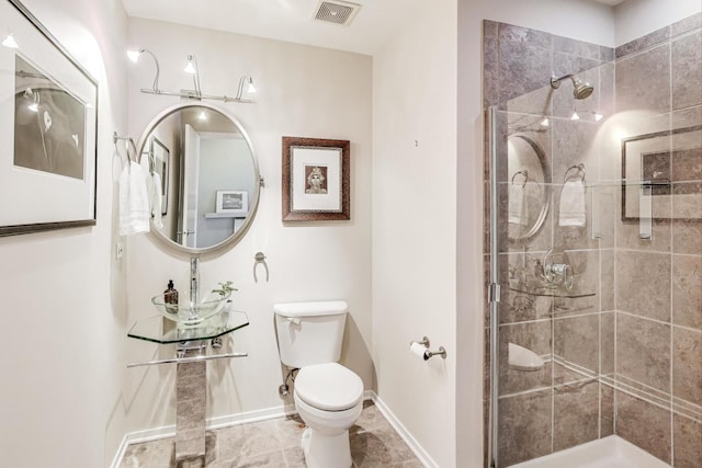 1530 S State St Unit 17B, Chicago, IL 60605 - bathroom with toilet, tiled shower, and baseboards