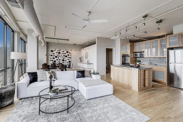 1530 S State St Unit 17B, Chicago, IL 60605 - living area with light wood finished floors and a ceiling fan
