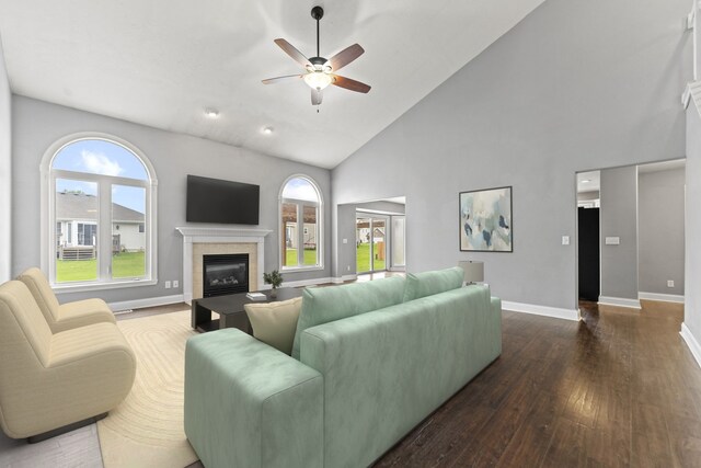 1924 Prestwold Pl, Machesney Park, IL 61115 - living room with a ceiling fan, hardwood / wood-style flooring, high vaulted ceiling, a tiled fireplace, and baseboards