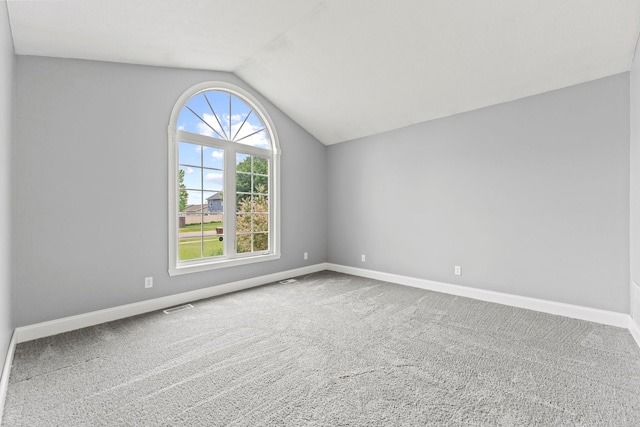 1924 Prestwold Pl, Machesney Park, IL 61115 - unfurnished room featuring lofted ceiling, baseboards, and carpet flooring