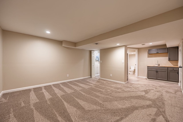 1924 Prestwold Pl, Machesney Park, IL 61115 - finished basement featuring light colored carpet, wet bar, baseboards, and recessed lighting