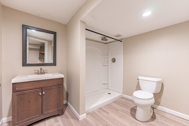 1924 Prestwold Pl, Machesney Park, IL 61115 - full bathroom with wood finished floors, toilet, a shower, and vanity