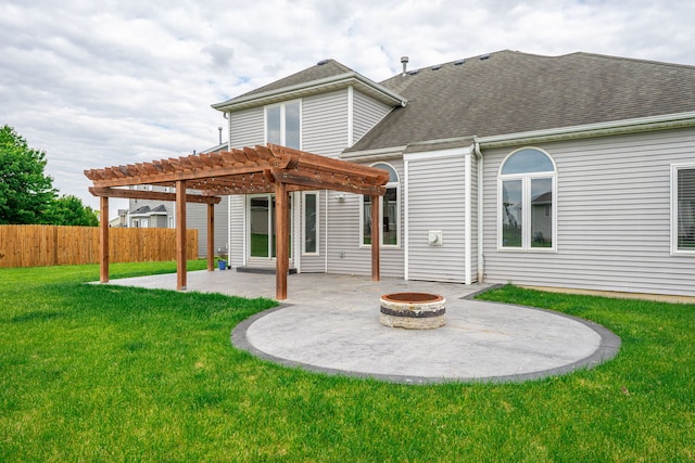 1924 Prestwold Pl, Machesney Park, IL 61115 - back of house with a pergola, an outdoor fire pit, a patio area, and a shingled roof
