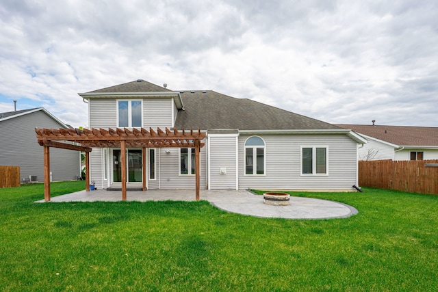 1924 Prestwold Pl, Machesney Park, IL 61115 - back of property featuring a pergola, a fire pit, a patio, and a shingled roof