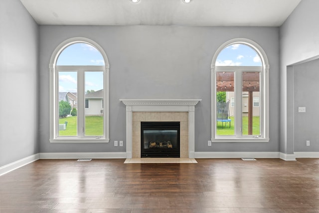1924 Prestwold Pl, Machesney Park, IL 61115 - unfurnished living room with plenty of natural light, a fireplace, wood finished floors, and recessed lighting