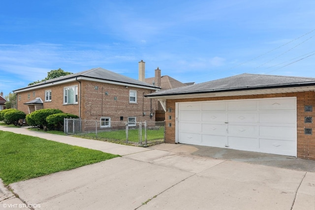 5200 S Mozart Ave, Chicago, IL 60632 - view of property exterior with brick siding, a gate, and a detached garage