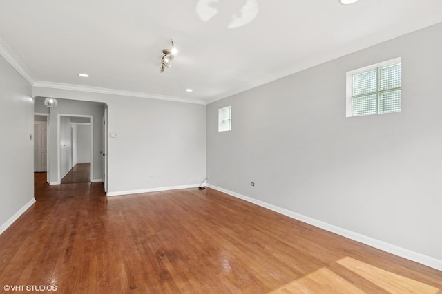 5200 S Mozart Ave, Chicago, IL 60632 - spare room featuring baseboards, wood finished floors, ornamental molding, and recessed lighting