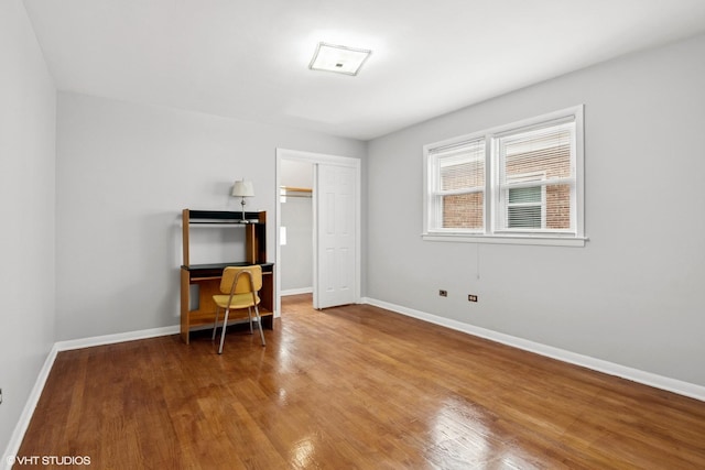 5200 S Mozart Ave, Chicago, IL 60632 - bedroom with wood finished floors, baseboards, and a closet