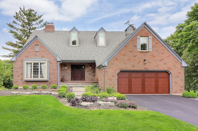 841 Turnbridge Cir, Naperville, IL 60540 - view of front facade featuring a shingled roof, driveway, brick siding, a chimney, and a front yard