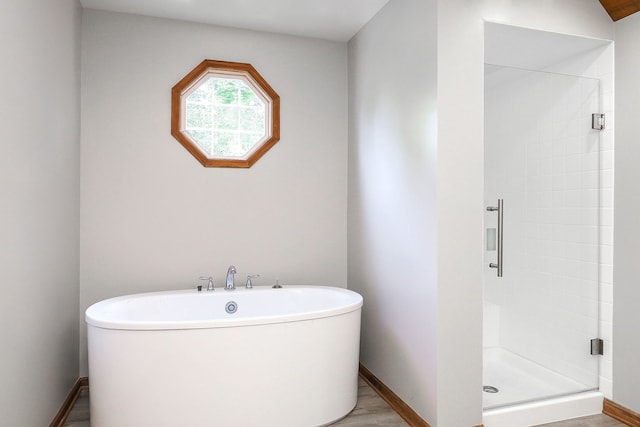 841 Turnbridge Cir, Naperville, IL 60540 - full bath featuring a stall shower, a soaking tub, baseboards, and wood finished floors