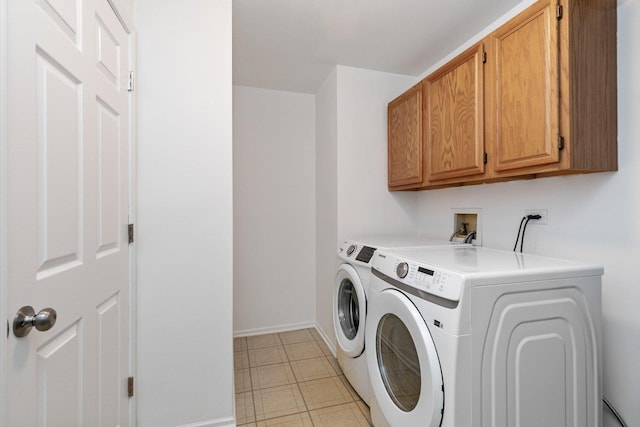 1623 Camberley Ct, Bartlett, IL 60103 - laundry area with cabinet space, washer and dryer, and baseboards