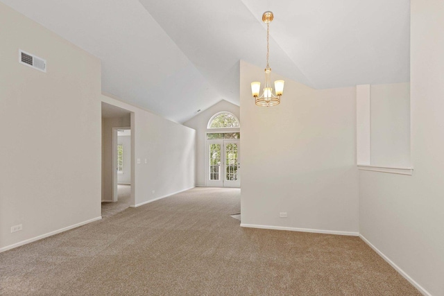 1623 Camberley Ct, Bartlett, IL 60103 - unfurnished room with carpet floors, lofted ceiling, a chandelier, and baseboards