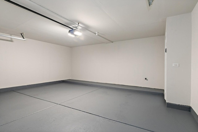 1623 Camberley Ct, Bartlett, IL 60103 - garage with a garage door opener and baseboards