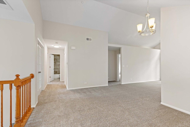 1623 Camberley Ct, Bartlett, IL 60103 - carpeted spare room with a chandelier, baseboards, and vaulted ceiling