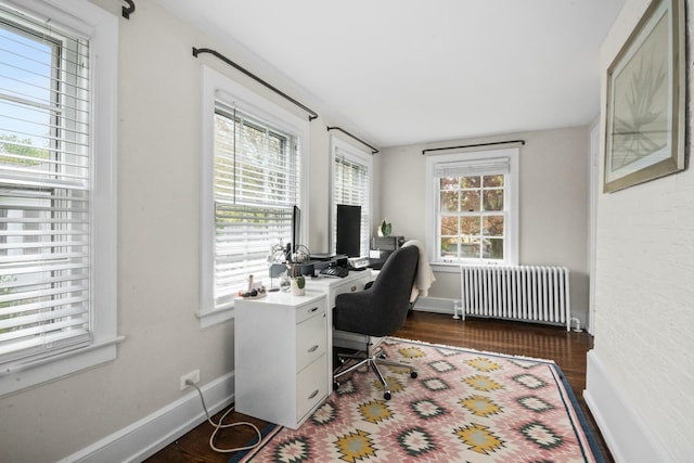 2906 Lincoln St, Evanston, IL 60201 - office space featuring radiator heating unit, baseboards, and dark wood finished floors