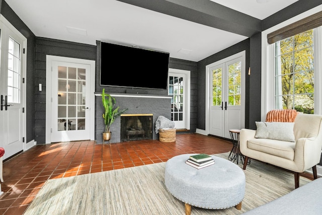 2906 Lincoln St, Evanston, IL 60201 - tiled living room with a premium fireplace and baseboards