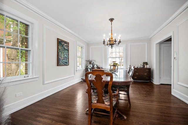 2906 Lincoln St, Evanston, IL 60201 - dining area featuring a chandelier, plenty of natural light, dark wood-style flooring, and ornamental molding