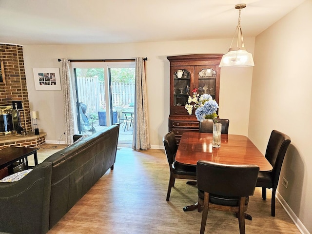 1830 Chestnut Ave Unit 1830, Glenview, IL 60025 - dining room featuring light wood-style floors and baseboards