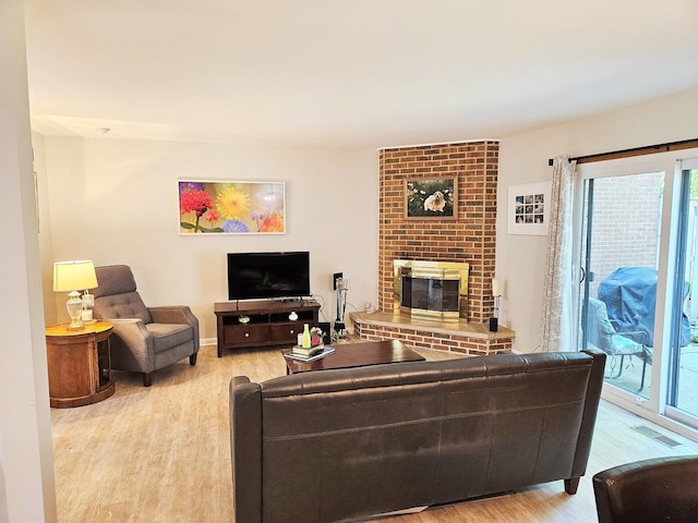 1830 Chestnut Ave Unit 1830, Glenview, IL 60025 - living room with wood finished floors and a fireplace
