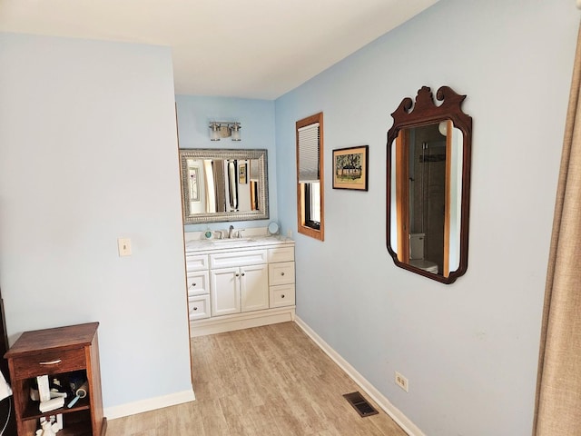 1830 Chestnut Ave Unit 1830, Glenview, IL 60025 - hall with a sink and light wood finished floors