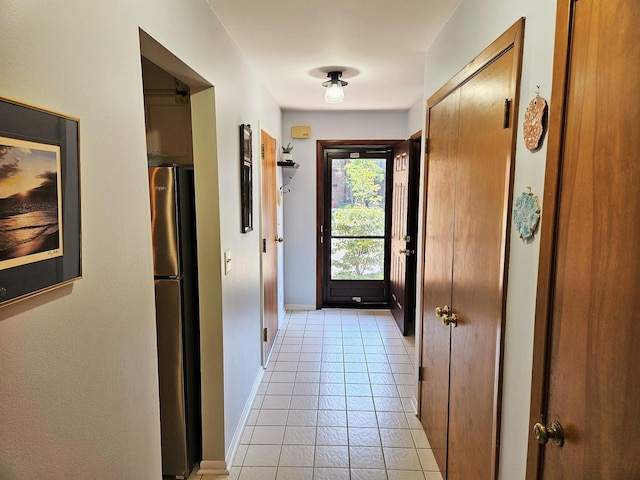 1830 Chestnut Ave Unit 1830, Glenview, IL 60025 - corridor featuring light tile patterned floors and baseboards