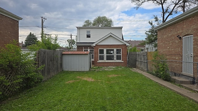 316 E 107th St, Chicago, IL 60628 - rear view of property featuring brick siding