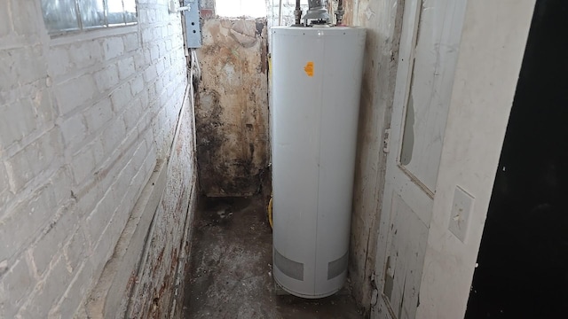 316 E 107th St, Chicago, IL 60628 - utility room featuring water heater