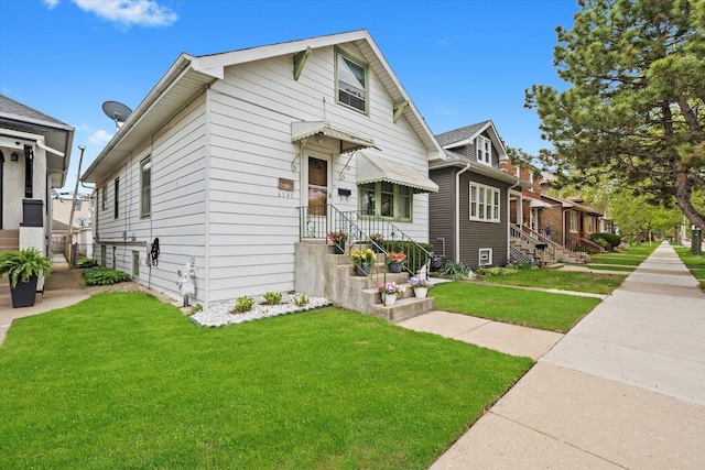 6141 W Peterson Ave, Chicago, IL 60646 - view of front facade with a front yard
