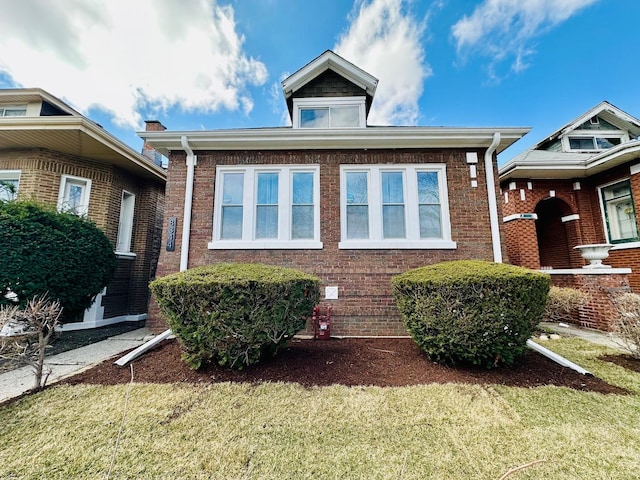 8344 S Ada St, Chicago, IL 60620 - bungalow featuring brick siding and a front lawn