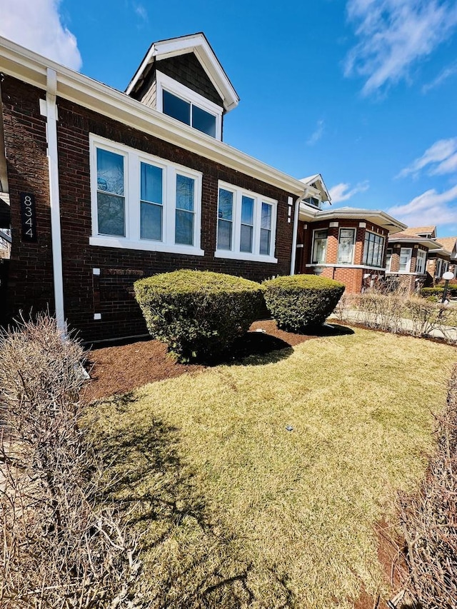 8344 S Ada St, Chicago, IL 60620 - rear view of property with brick siding and a lawn