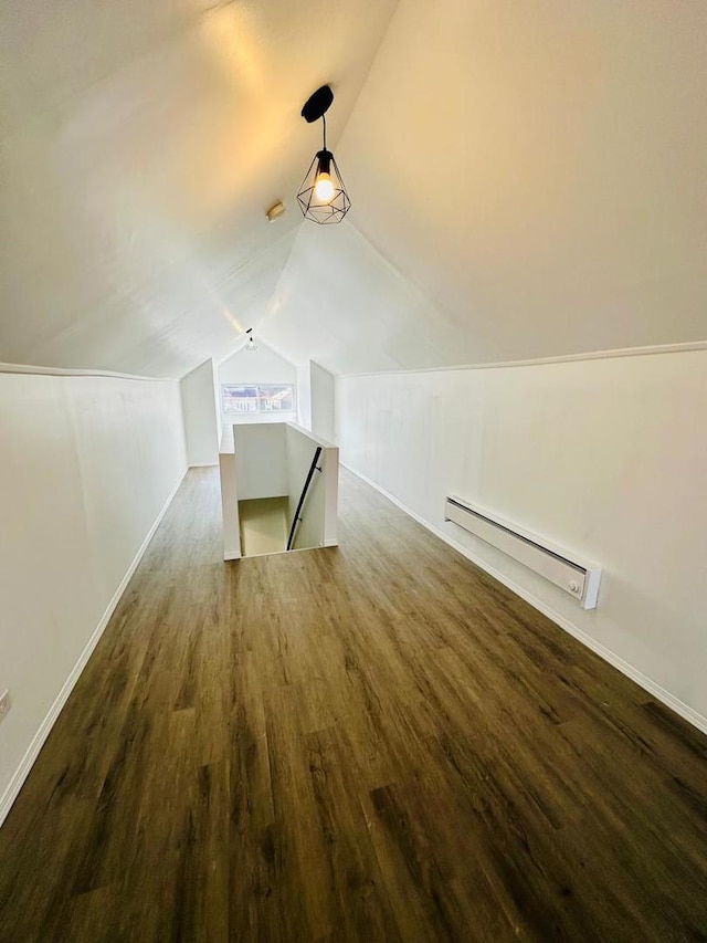 8344 S Ada St, Chicago, IL 60620 - additional living space featuring wood finished floors, a baseboard heating unit, vaulted ceiling, and baseboards