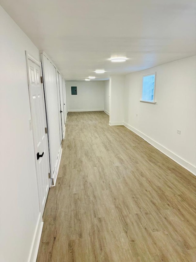 8344 S Ada St, Chicago, IL 60620 - below grade area featuring light wood-type flooring and baseboards