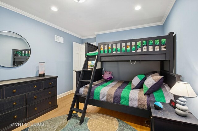 6209 N Legett Ave, Chicago, IL 60646 - bedroom with crown molding, light wood-style floors, and recessed lighting