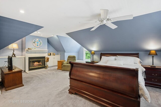 6209 N Legett Ave, Chicago, IL 60646 - bedroom with carpet flooring, vaulted ceiling, a fireplace, a ceiling fan, and recessed lighting