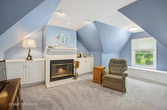 6209 N Legett Ave, Chicago, IL 60646 - sitting room featuring light colored carpet, vaulted ceiling, and a fireplace