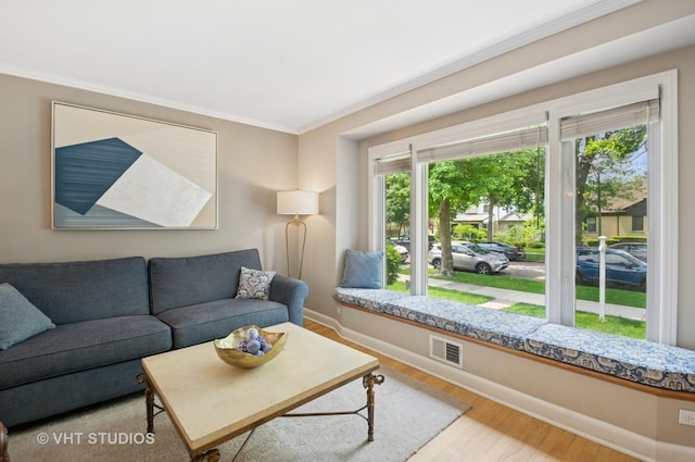 6209 N Legett Ave, Chicago, IL 60646 - living area featuring wood finished floors and ornamental molding
