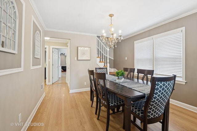 6209 N Legett Ave, Chicago, IL 60646 - dining room with a chandelier, stairway, light wood-style flooring, and ornamental molding