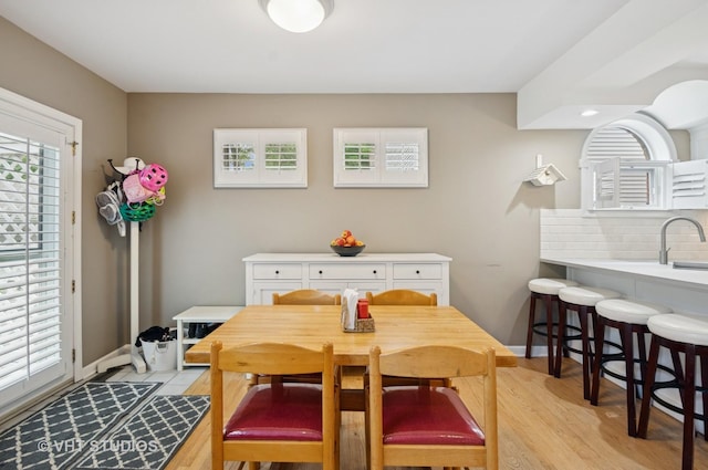 6209 N Legett Ave, Chicago, IL 60646 - dining area featuring light wood-style flooring and baseboards