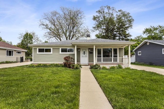 521 N 3rd Ave, Villa Park, IL 60181 - view of front of home with covered porch, a front yard, a chimney, and roof with shingles