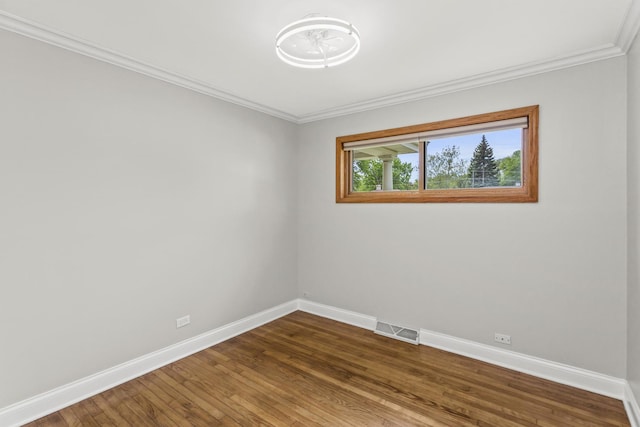 521 N 3rd Ave, Villa Park, IL 60181 - spare room with baseboards, crown molding, and wood finished floors