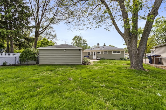 521 N 3rd Ave, Villa Park, IL 60181 - view of yard featuring an outbuilding and a patio area
