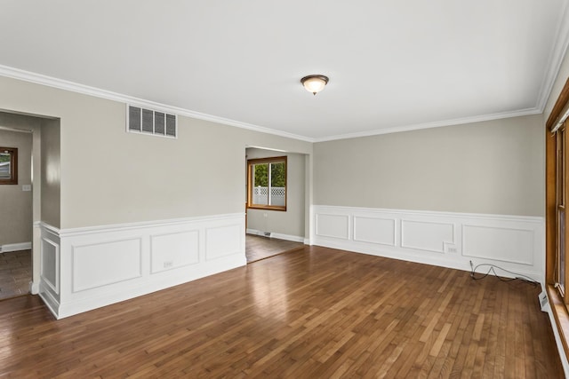 521 N 3rd Ave, Villa Park, IL 60181 - empty room with crown molding, hardwood / wood-style floors, and a wainscoted wall